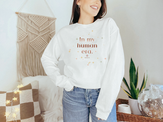 Woman wearing a White In My Human Era garment-dyed sweatshirt
